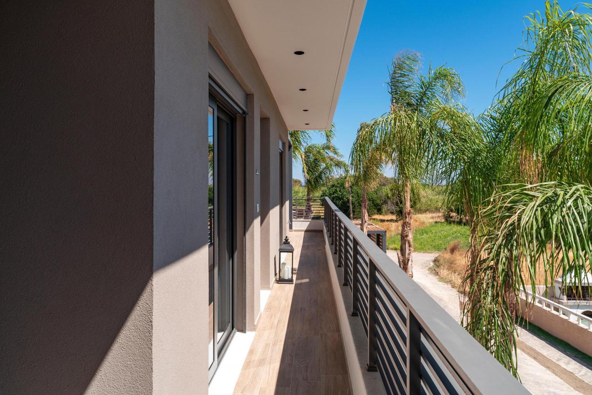 Palmeral Luxury Suites Kremastí Quarto foto